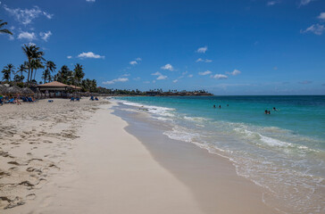 Beautiful view of Eagle beach in Caribbean sea with white sands on sunny day. Aruba.