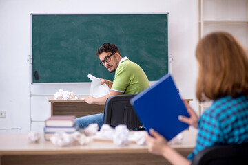 Two students having fun in the classroom