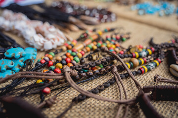 Obraz premium Many colorful bracelets from handcraft souvenirs shop