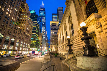 Scenic street and skyscrapers of New York City evening view,