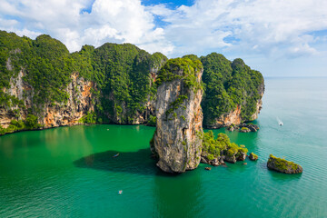 Ao Nang Tower, famous limestone rock near the Krabi town, Thailand. Aerial drone view to big rocks above turquoise sea. Exotic tourist destination.