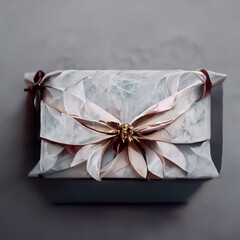Elegant white giftbox with golden ribbon and white feathers, christmas packaging
