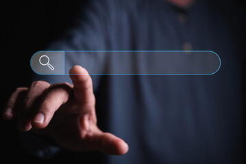 man hand point on search box for information in a virtual search screen box