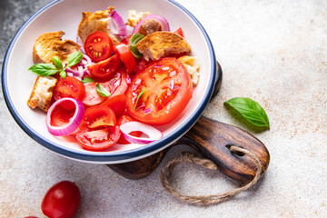 tomato salad panzanella bread, onion vegetable meal food snack on the table copy space food background  top