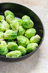 green Brussel sprouts raw vegetable food snack on the table copy space food background top