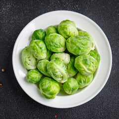 green Brussel sprouts raw vegetable food snack on the table copy space food background top