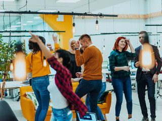 Obraz premium Group of business people throwing paper in air at modern startup office, team success and job done concept