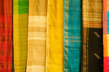 Handmade Indian silk sari / saree with golden details, woman wear on festival, ceremony and weddings, expensive sarees are famous for their gold and silver zari, brocade. Incredible India.