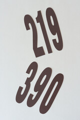the numbers 219 and 390 on blank paper