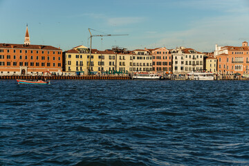 view of the lagoon and colorful architecture in Venice, Italy
