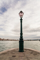 Punta della Dogana and old street light 