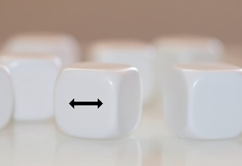 Pile of white dices with an arrow