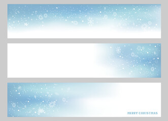 Three blue sky winter banners set with snowfall