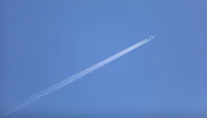 Poster double track in the sky from a jet plane © serikbaib