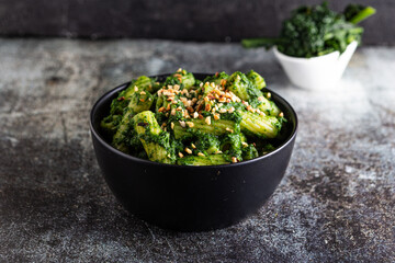 Pasta with black cabbage pesto and chopped hazelnuts.