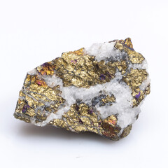 Natural stone chalcopyrite on a white background. Mineral of golden color on a white background
