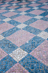 pavement with granite cubes in three colors