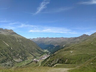 Fototapeta premium Beautiful mountainous landscape with green grass on a sunny day