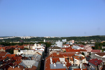 Panoramic view of Kosice Old city from St. Elisabeth Cathedral, scenic daytime cityscape with streets, red tiled roofs of medieval buildings and blue cloudy sky, urban skyline, Slovakia (Slovensko)