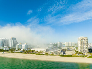 Obraz premium Aerial drone photo of the Deauville Hotel moments after it's implosion