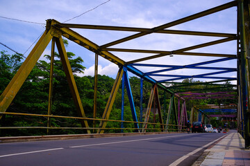 Fototapeta na wymiar Abstract Defocused Blurred Background The beauty of the iron bridge in the Pangandaran area - Indonesia. Not Focus