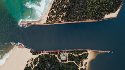 The Entrance at Lakes Entrance Victoria Australia showing warning signs in the channel for boating 