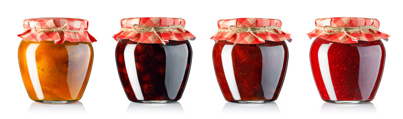 collection of fruit jam in jars covered with paper isolated on white