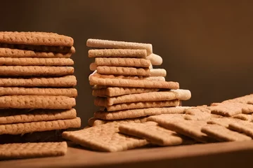 Wandcirkels aluminium graham crackers, an american food item from the 1800s, a food ingredient © Omer Mendes/Wirestock Creators
