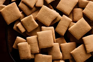 Fotobehang graham crackers, an american food item from the 1800s, a food ingredient © Omer Mendes/Wirestock Creators