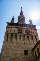 Obraz premium Medieval fortified citadel of Sighisoara city and the famous Clock Tower