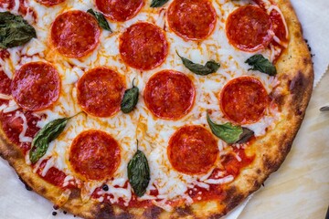 Top view of tasty pepperoni pizza