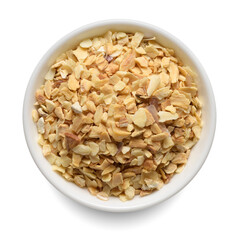 Dried garlic granules in white bowl isolated on white. Top view.