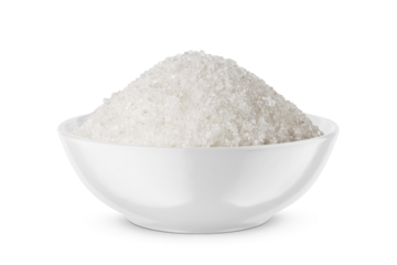 Crystal sugar in round bowl isolated on white. Front view.