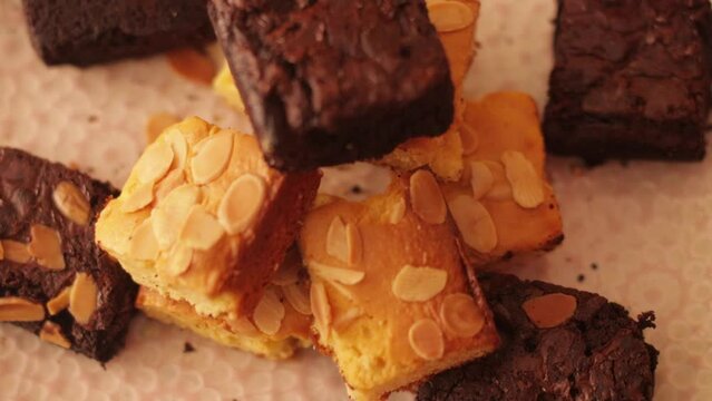 Brownies falling on top of blondies