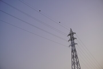 high voltage post.High-voltage tower sky background.