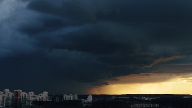 A shot of thunderclouds over a city