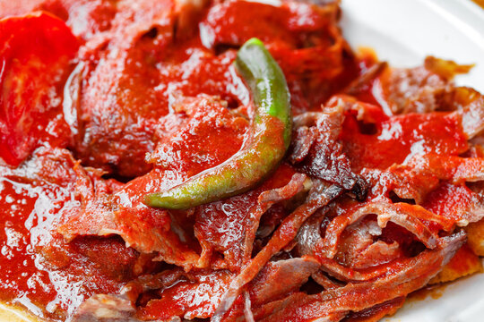 Iskender kebab, fried lamb with tomato sauce in Turkish