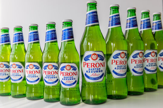 London. UK. 04.09.2020. Bottles of Peroni beer showing its brand labels isolated in white.