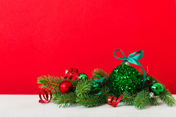 New Year Christmas tree toy, branches of a christmas tree, New Year decorations on a colored background