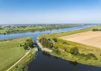 Fototapeta na wymiar Gdańska Głowa floodgate connecting the Vistula river and Szkarpawa river