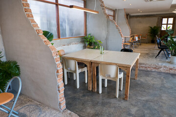 Empty Chairs and table in modern office,industrial style.