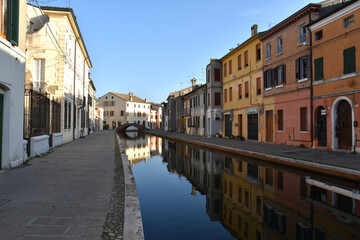 Fototapeta na wymiar Picturesque medieval lagoon village of Comacchio, called the little Venice, province of Ferrara - morning view without people