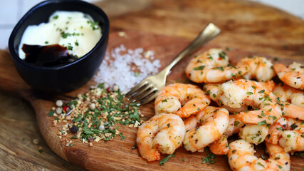 Fresh juicy fried shrimp with spices, garlic and sea salt.