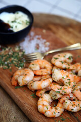 Fresh juicy fried shrimp with spices, garlic and sea salt.