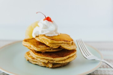 Closeup shot of Multigrain Pancakes with cherry