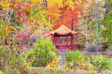 The pagoda at the Chuang Yen Monastery in Putnam County NY is located at the  Seven Jewel Lake.