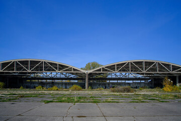 Metal structures German air hangars, abandoned military airfield Notif on Baltic spit.