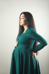 Fototapeta premium pregnant woman hand on the belly