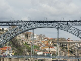 Low-angle view of a beautiful bridge in Porto, Portugal