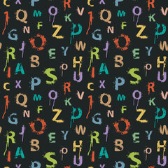 Seamless pattern with alphabet letters in form of colored paint splashes and blots. Abstract vector background with latin letters. Suitable for wallpaper, wrapping paper or fabric